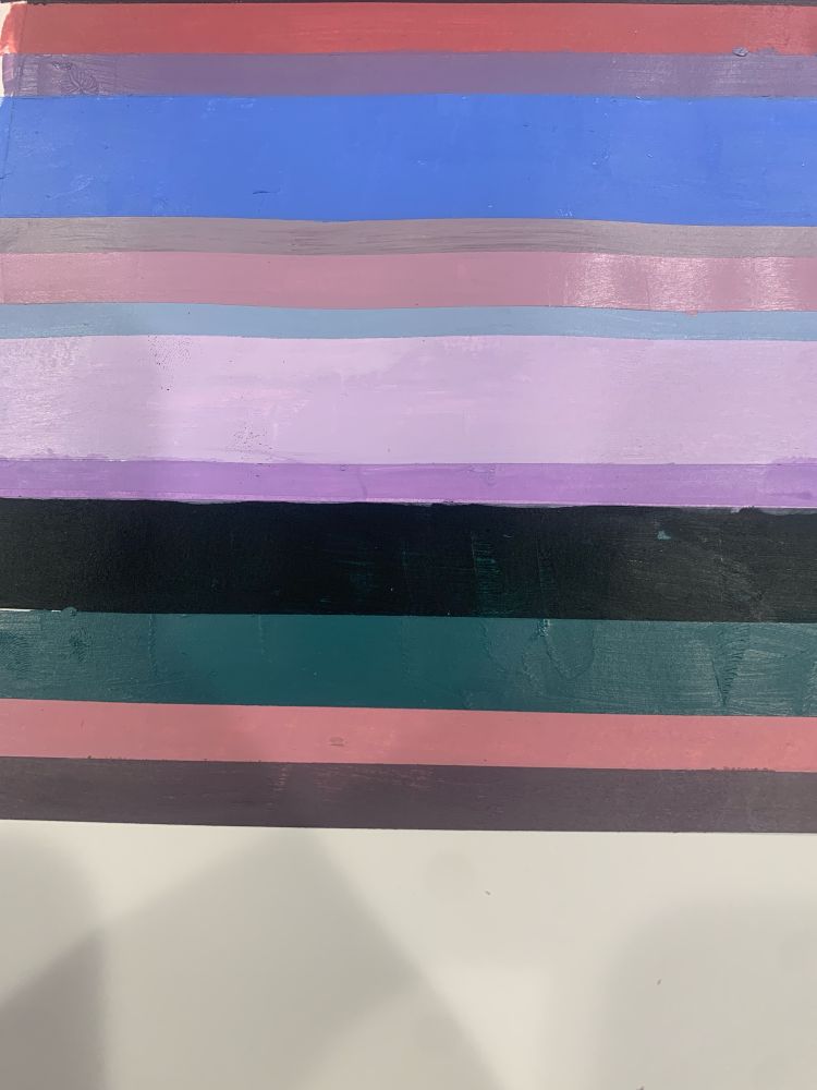 A variety of colors in horizontal lines, with the bottom half left empty