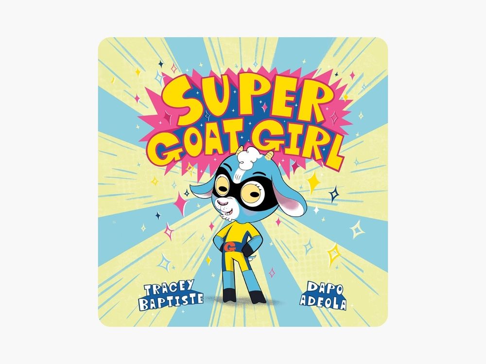 Cover of Super Goat Girl showing a smiling blue goat in a yellow and navy short unitard uniform with a red G on the belt, and a black mask over her eyes. The background is a starburst in light yellow and teal, and the title is in bright yellow with a bold pink starburst background.