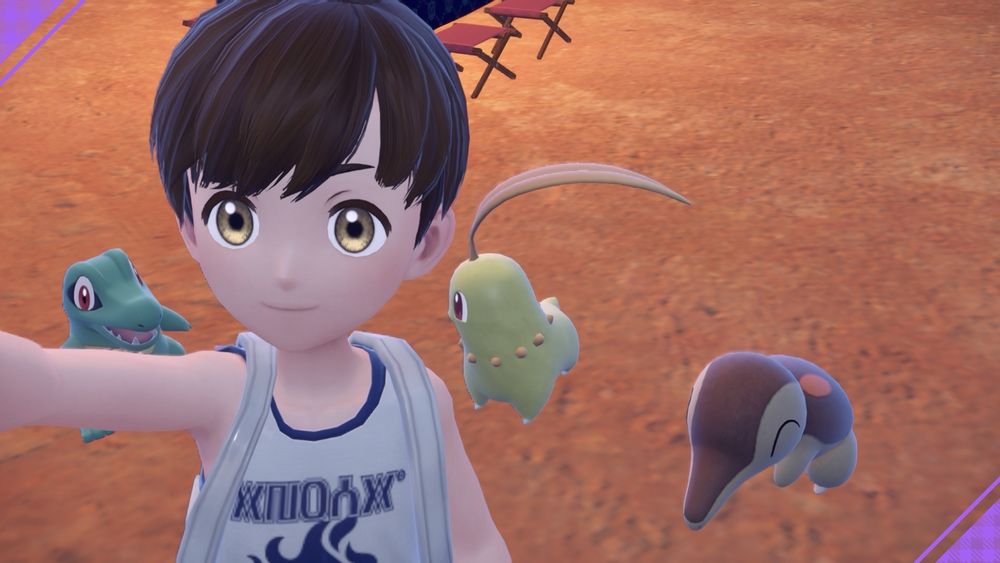 Selfie of my Pokemon Violet character with shiny generation 2 starters.