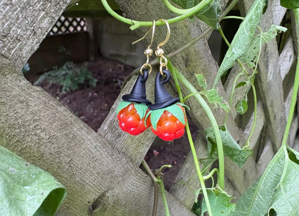 cloudberries made from clay with black witch hats(earrings)