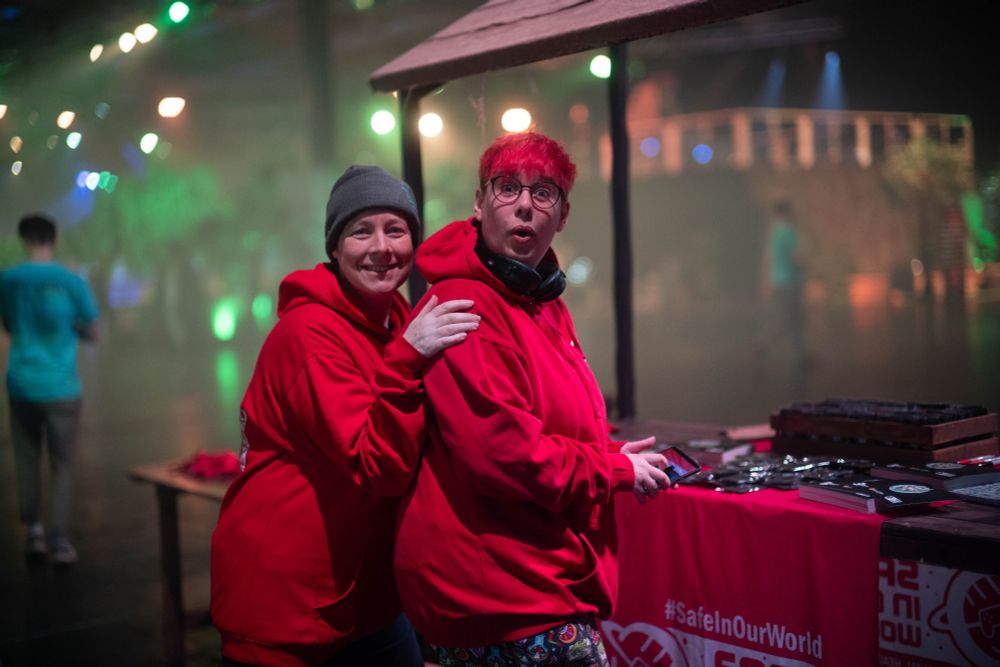 Bridie and Flop at RuneFest 2025, looking after the Safe In Our World stall.