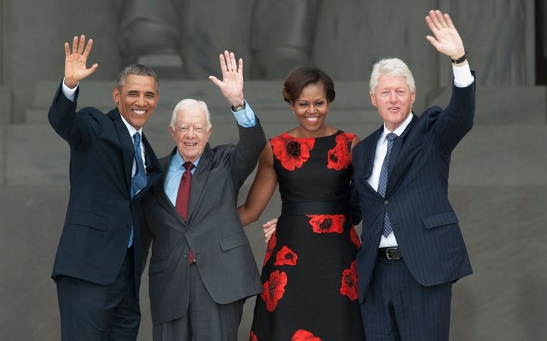 Presidents Obama Carter and Clinton, and First Lady Michelle Obama.