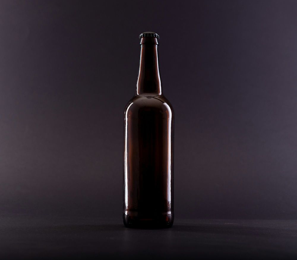 A photo of beer bottle. Photo by Joseph Gonzalez on Unsplash