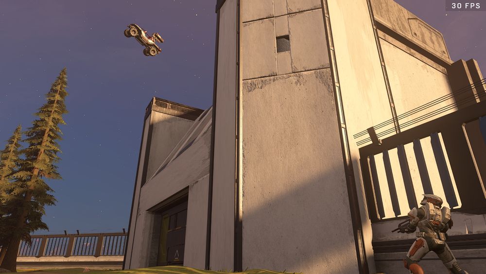 Spartan looking up at a Gauss hog frozen in the air. Machinima plus was used to freeze it