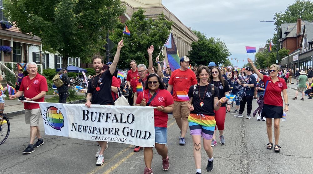 Buffalo Newspaper Guild members march down Elmwood Avenue in 2024 Buffalo Pride Parade
