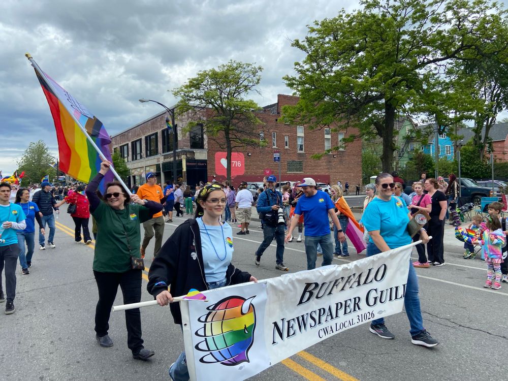 Buffalo Newspaper Guild members march down Elmwood Avenue in the Buffalo Pride Parade