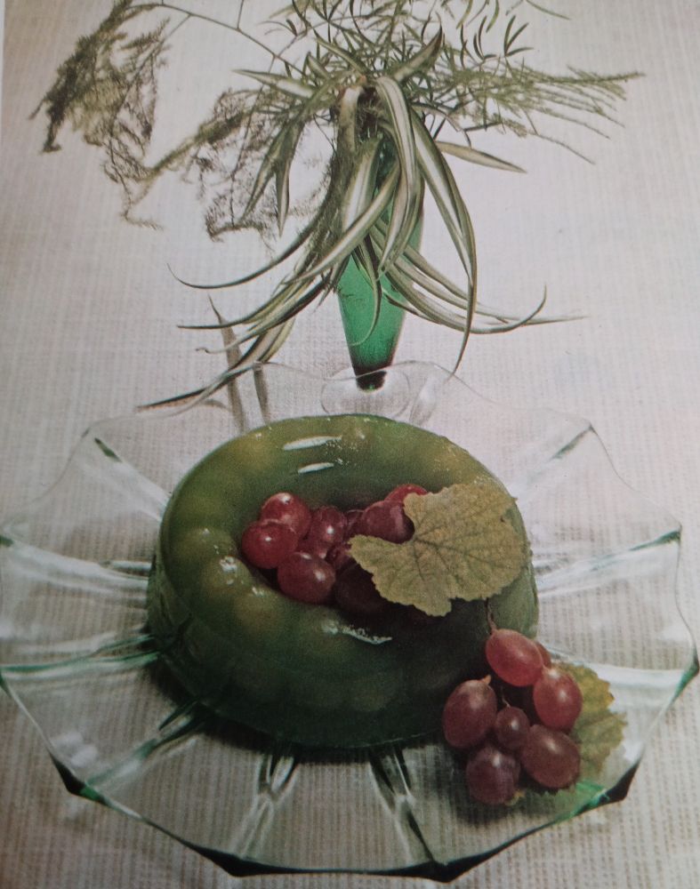 Create a hauntingly elegant green grape jelly. Press ¾ lb grapes for juice, mix with sauternes, lemon juice, water, and dissolved gelatin. Sweeten, pour halfway into a mould, and set. Add 12 grapes around the edge, cover with the remaining mix, and chill.  