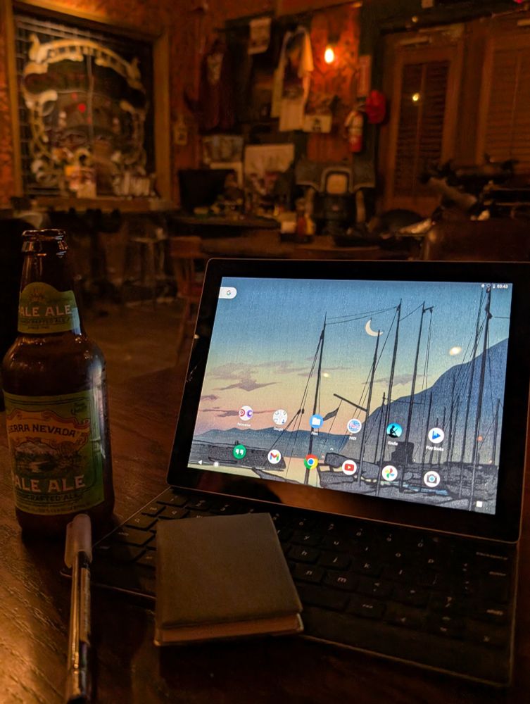A tablet, a drink, and The pioneer saloon 