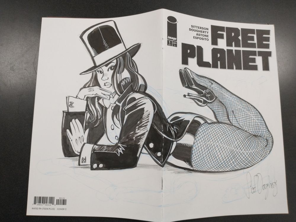 FREE PLANET sketch cover with an original drawing of Zatanna in her top hat and fishnets. 