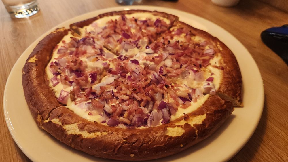 The bacon, red onion, and sour cream 'brizza', a German take on pizza. 
