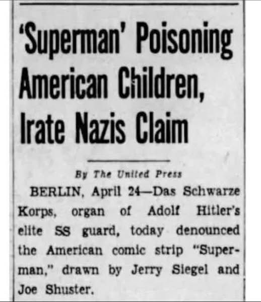 A newspaper clip seemily from the 1930s with the headline: Superman poisoning American children, irate Nazis claim. 