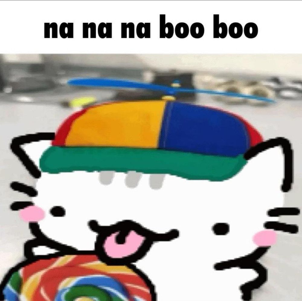 drawing of a cat wearing a propeller hat and licking a lollipop with the caption "na na na boo boo"