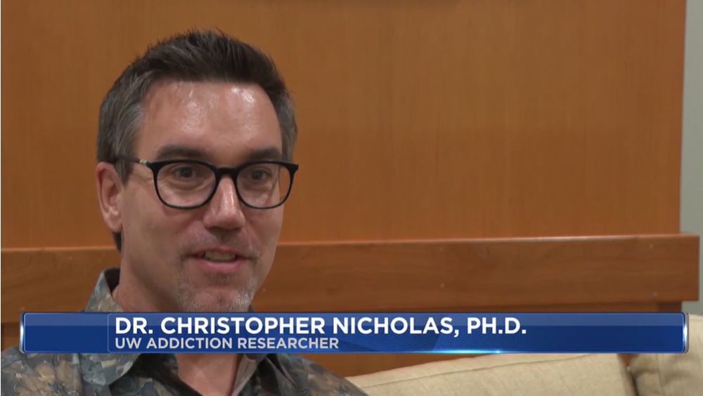 A screengrab of Dr. Christopher Nicholas, PhD, on WMTV 15 News with a lower third reading his name above "UW Addiction Researcher."