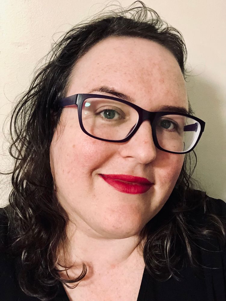 it’s me, and my hair has a kind of bigness and glossiness i would associate with 1980s hairstyles