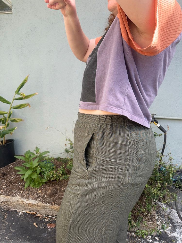 This picture is side profile and closer up from her chest to knees showing details of the garments. 
Pants details for fellow sewists: I used daughter Judy’s elastic waist hack for the coe trouser found in her substack. It worked beautifully! I shortened leg length 2”.