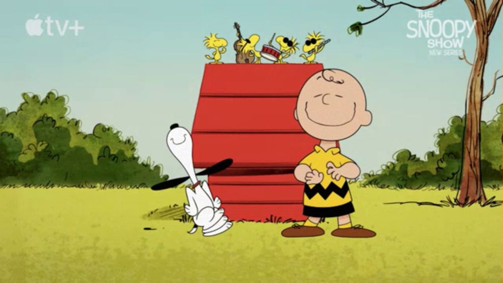 a poster for the snoopy show shows charlie brown standing next to snoopy