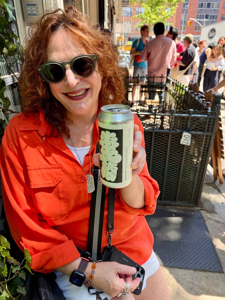 Lori with a can of Saltfields Rice Lager