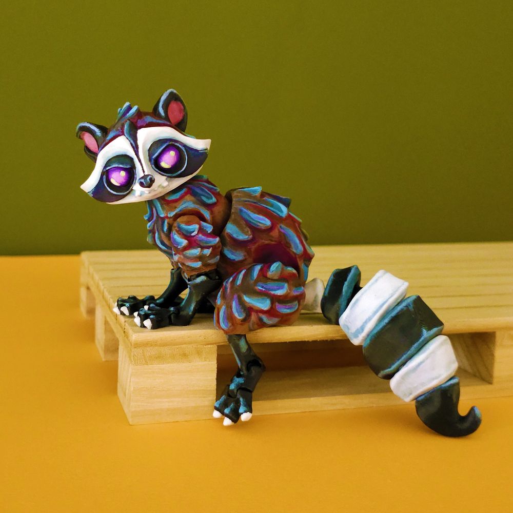 3d printed and handpainted raccoon sitting on a wooden platform, on a green background, sitting, sassily.