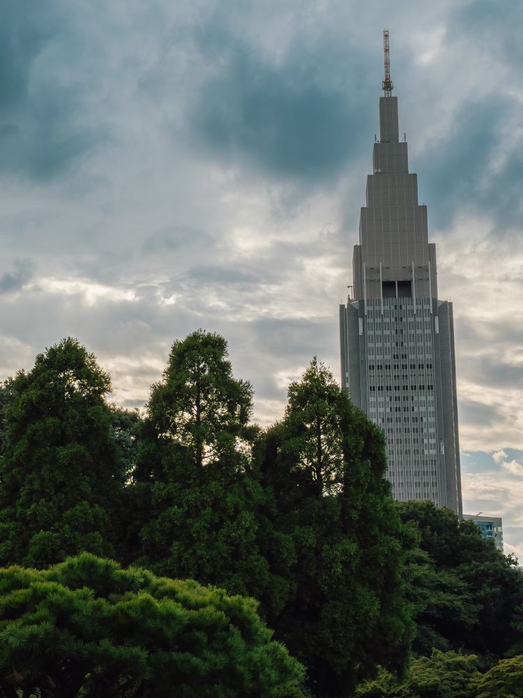 Picture of the NTT Docomo Yoyogi Building taken from the Shinjuku Gyoen National Garden