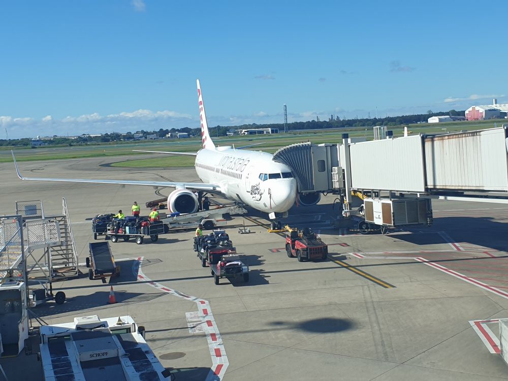 Virgin Australia plane at gate in BNE