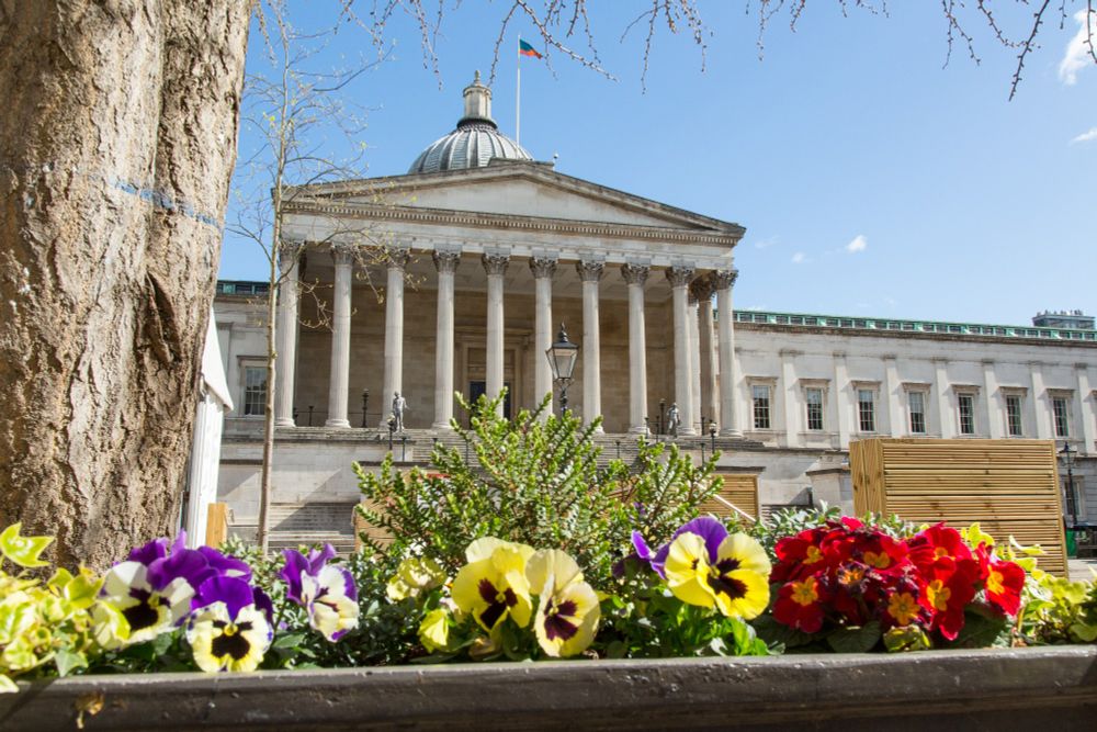 UCL’s Portico with flowers in its foreground. 