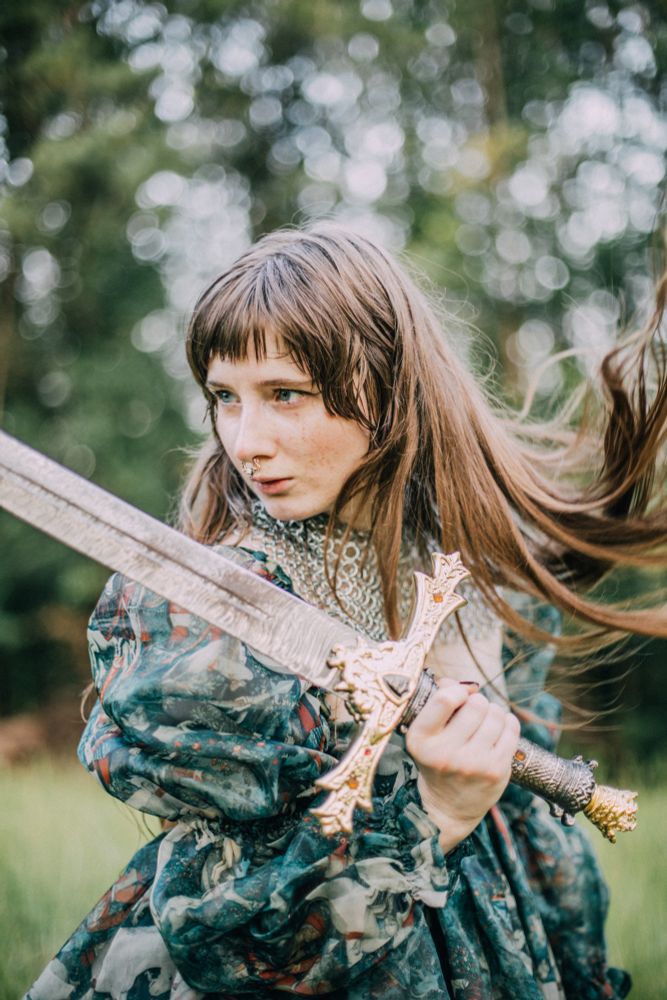 Brooke posing with a sword