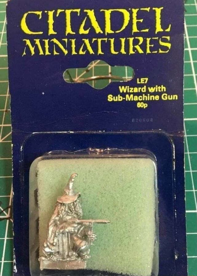 A photo of a 1980s era Citadel Miniature in original packaging.
The mini is labelled “Wizard with submachine gun” and originally cost 60p.