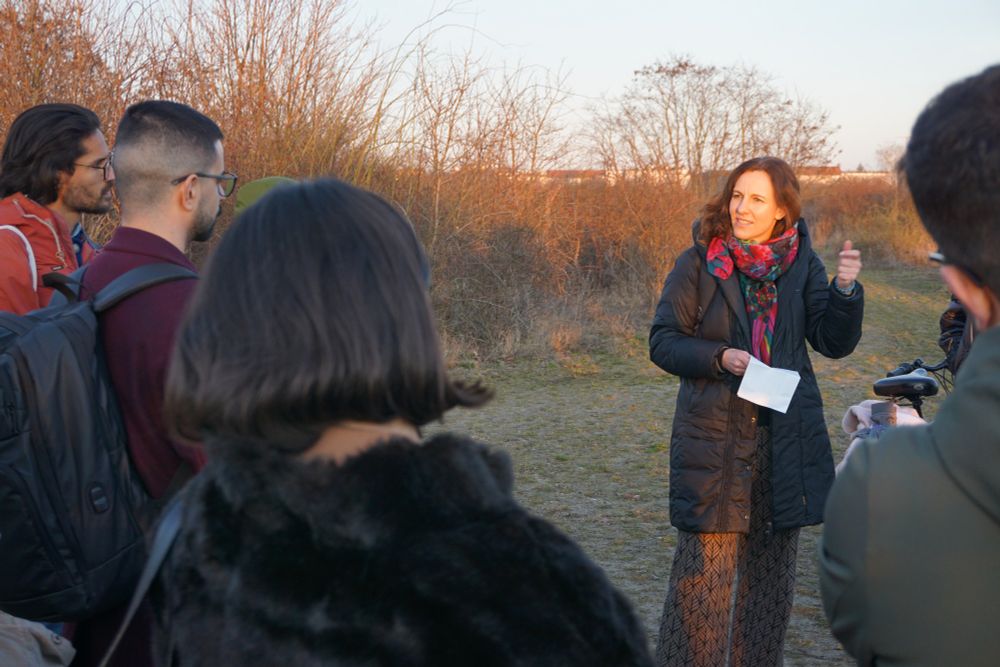 A person speaking to a group in a park in Berlin