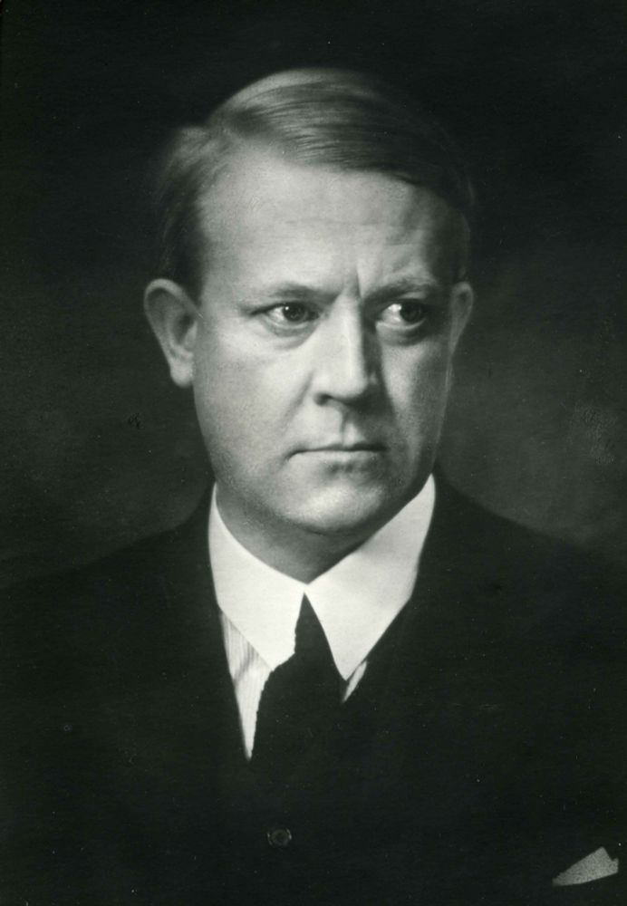 A black and white studio photo of Vidkun Quisling. Look him up. 
