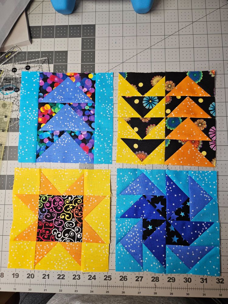 Four out of five of the blocks finished for this months block basics class by Karen Brown of Just Get It Done Quilts 