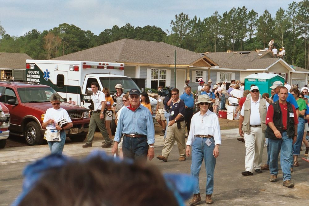 Jimmy and Rosalyn Carter greeting participants at the 2003 habitat for humanity jimmy carter work project in Valdosta, Georgia