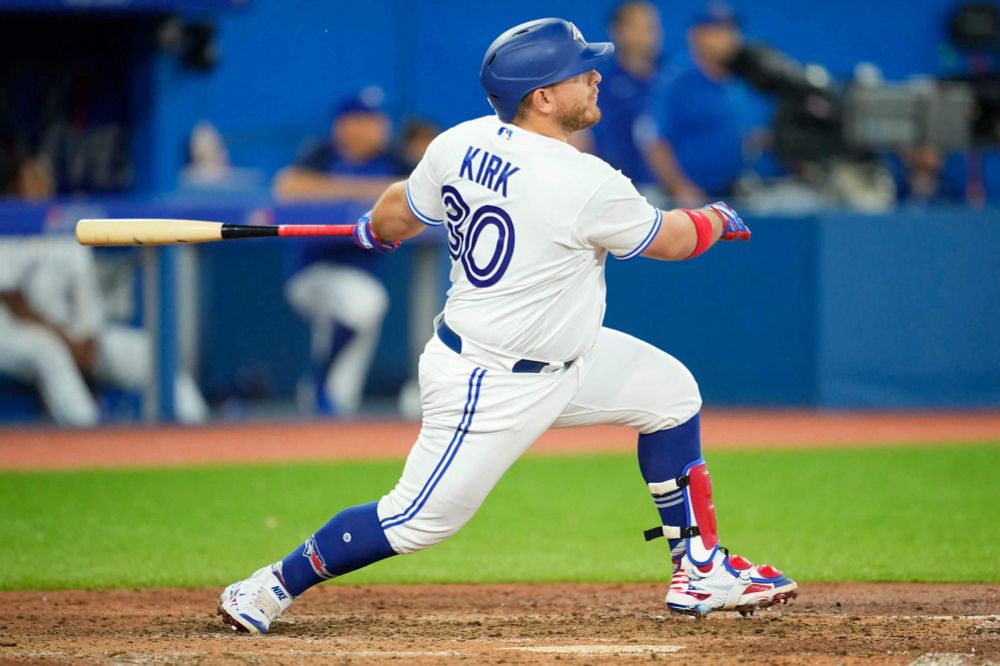 Blue Jays catcher Alejandro “Captain” Kirk swinging the bat