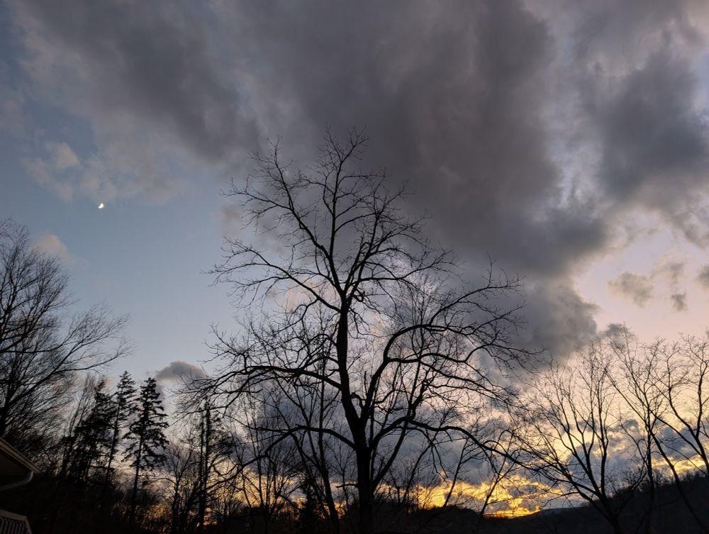 Another view of sunset over Cumberland valley. The moon is visible on the left side of the picture.