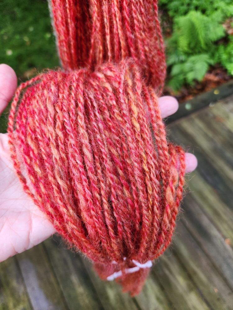 Orange and red handspun yarn