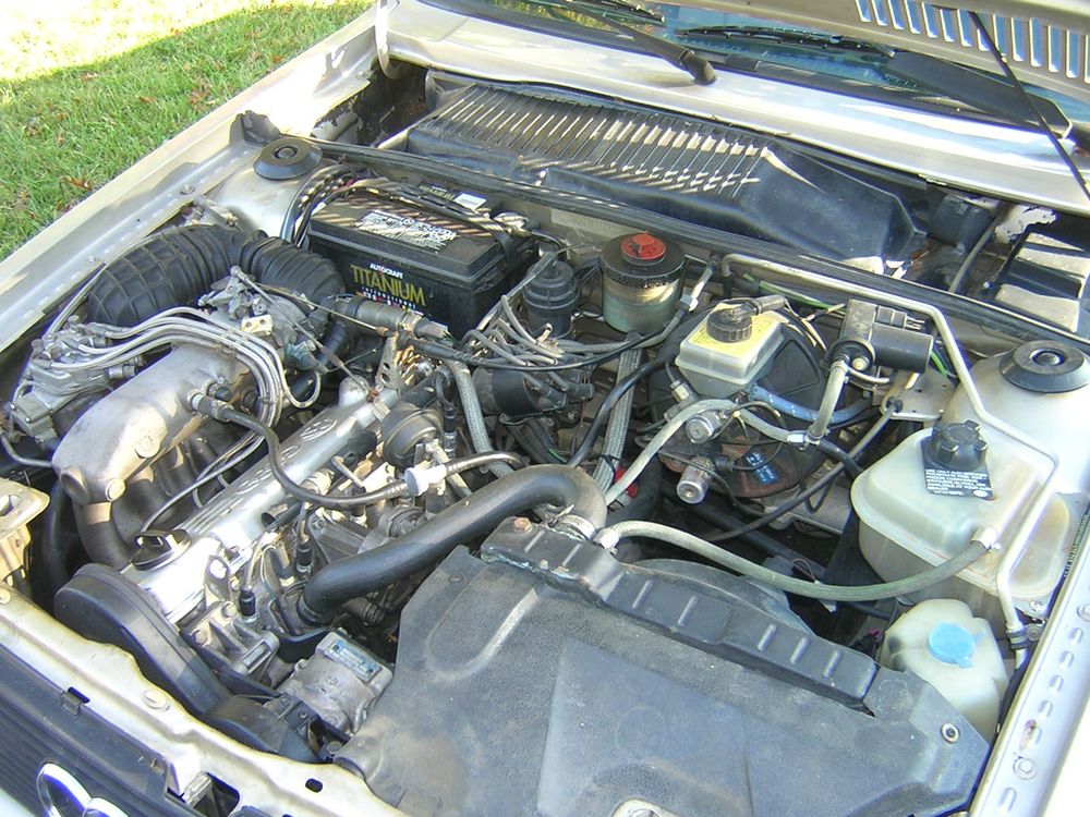 A 1986 Audi 4000CS quattro's 2.2l 5-cylinder engine in its bay.
