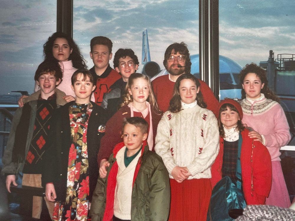 A cast photo of the kids from "Home Alone" with our AD in the American Terminal of O'Hare airport.