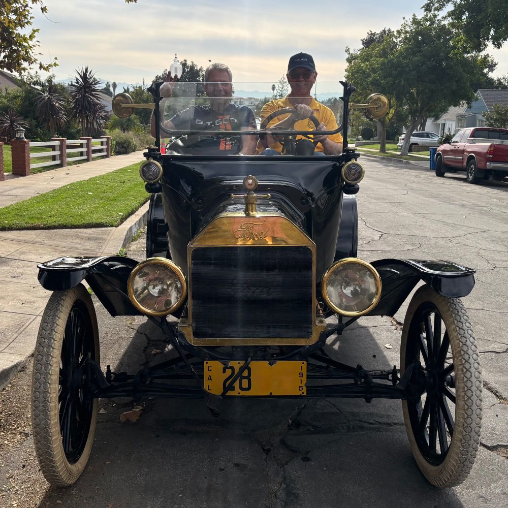 My Dad and his friend in a 1915 Ford Model T.