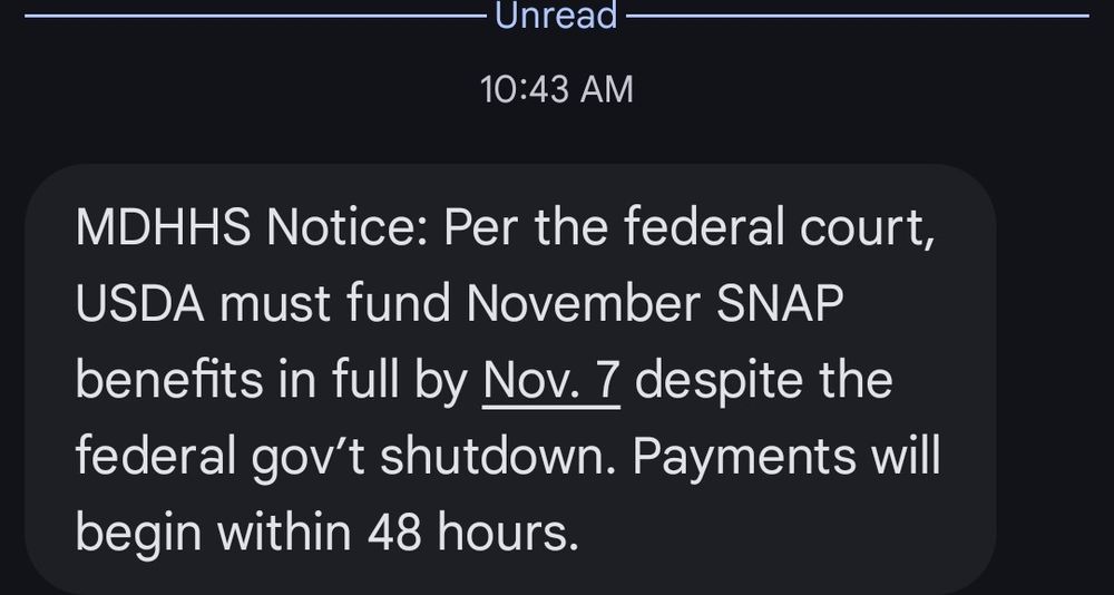 Text message received at 10:43 AM reading 'MDHHS Notice: Per the federal court, USDA must fund November SNAP benefits in full by Nov. 7 despite the federal gov't shutdown. Payments begin within 48 hours.'