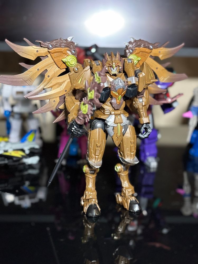 Transformers Age of the Primes Onyx Prime in Robot mode, a large brown robot with back wings, a large spear, and beast hooves for legs. 