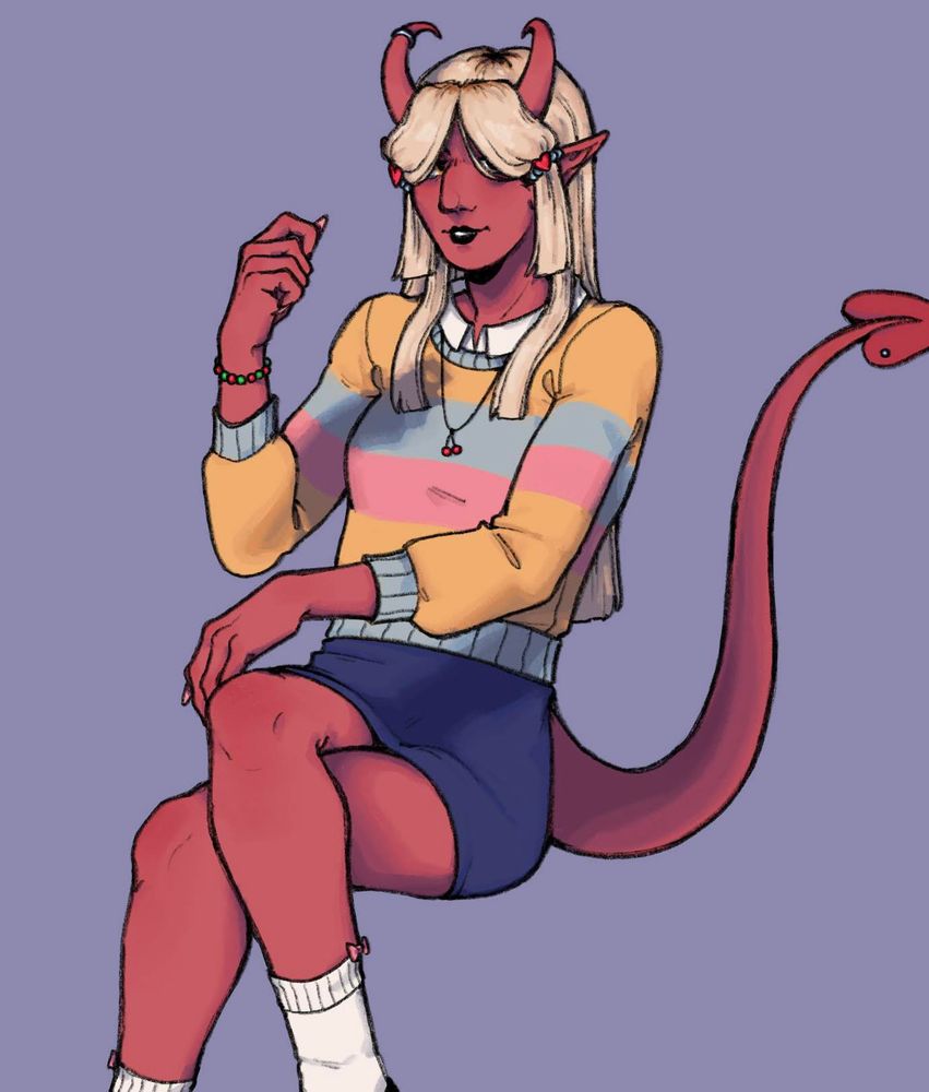 Śaşă (pronounced tsa shwa); A lighter red/pink-skinned character with long platinum blonde straight hair, curled horns and a tail. She is sitting with her legs crossed. Her hair covers her eyes. She is wearing a striped pink, blue and yellow sweater, a red and green bracelet, a necklace with a cherry pendant, and a dark blue skirt (her shoes are not visible). She is also wearing a ring on her right horn.