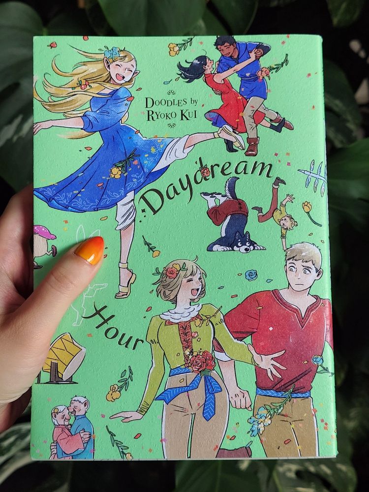 Holding up Doodles by Ryoko Kui: Daydream Hour, an artbook by the author of the Delicious in Dungeon manga