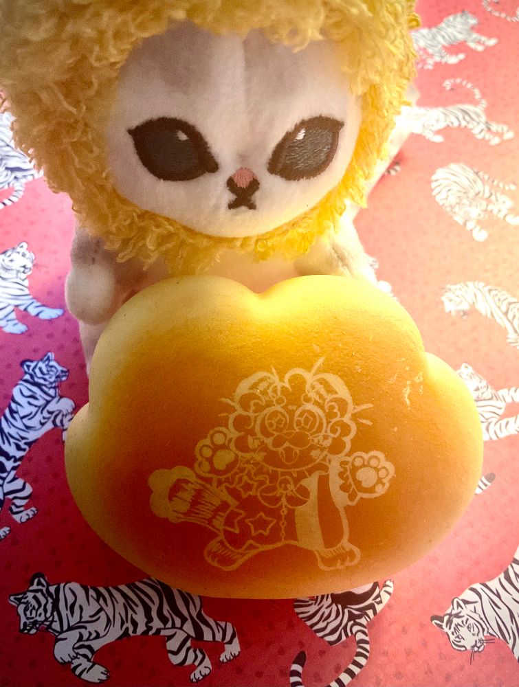 Boots squishy bread on tiger print paper 