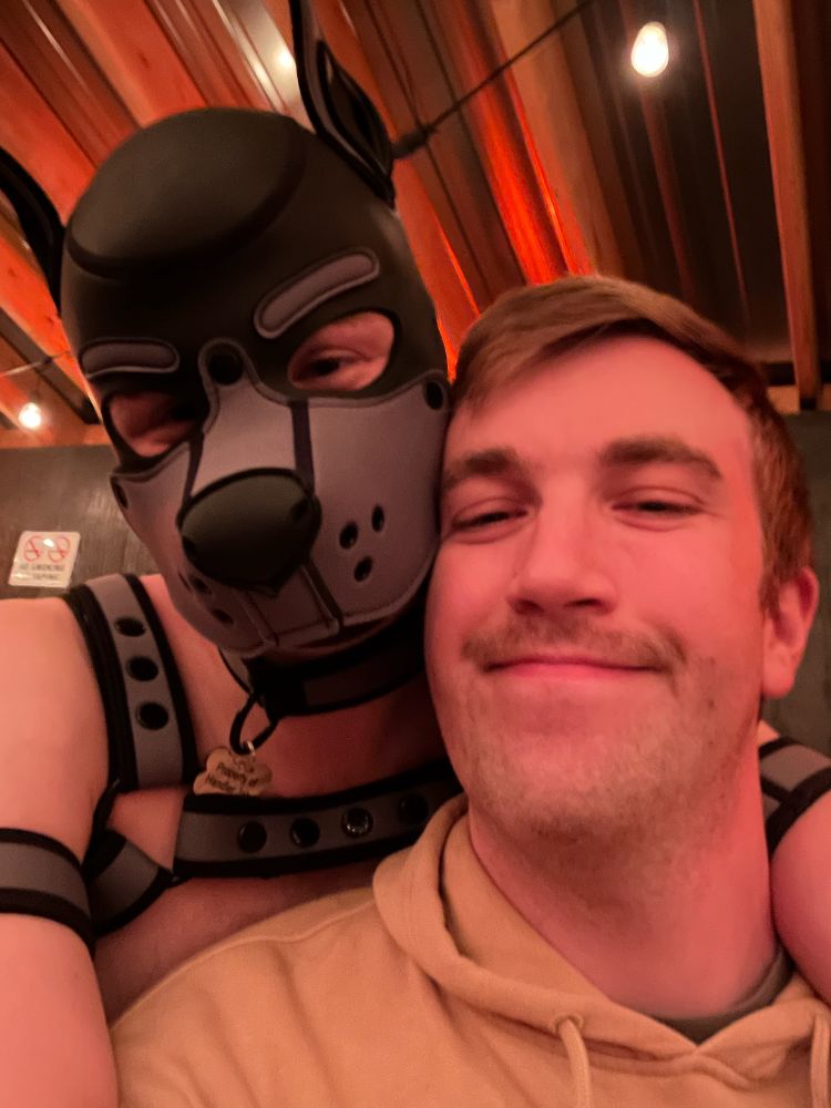 Me and my pup Wolfy. A human pup wearing gray gear