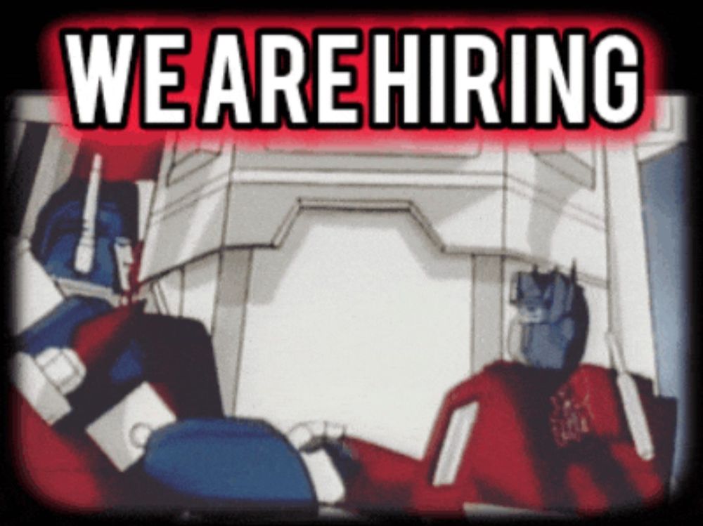 Oprtimus Prime and Ultra Magnus Shaking Hands with WE ARE HIRING text as the title.