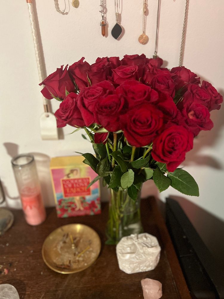 A bouquet of red roses on Aphrodite’s altar, because we share like that. 