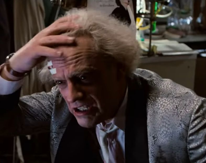 Doctor Emitt Brown holding his head in shock