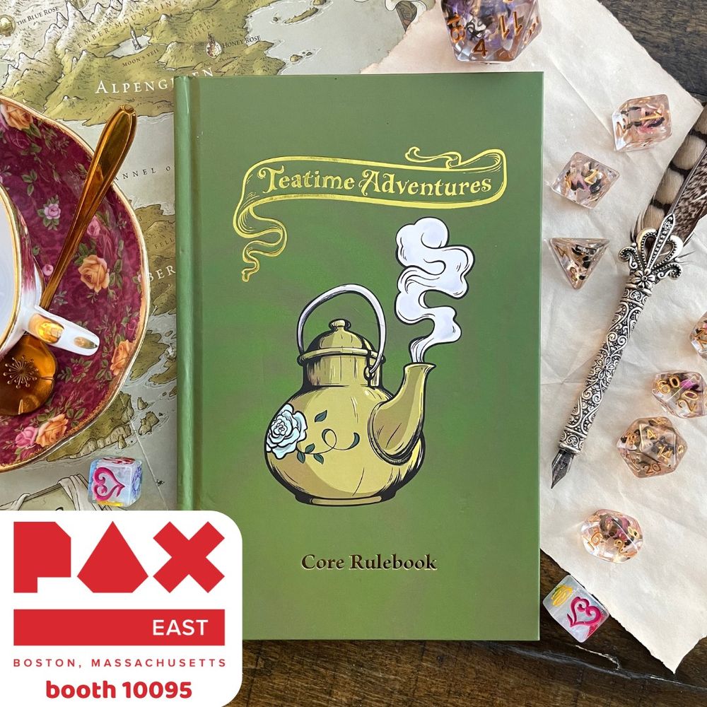 A green Teatime Adventures book sits on a table with tea, dice, and a quill, Pax East booth 10095