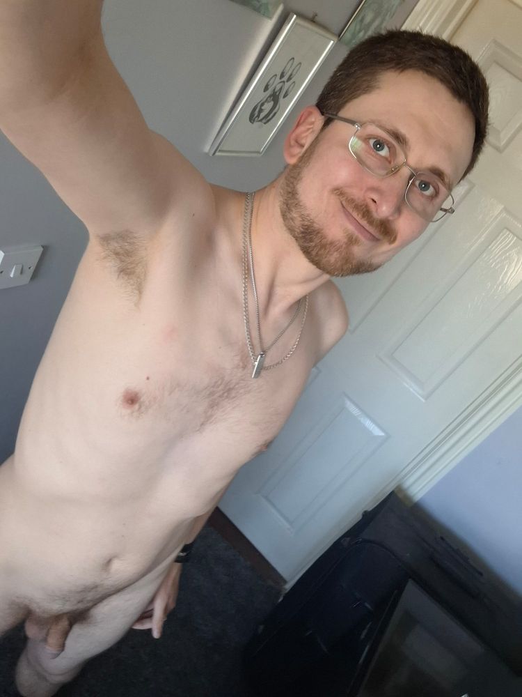 Naked on the landing by the chest freezer.