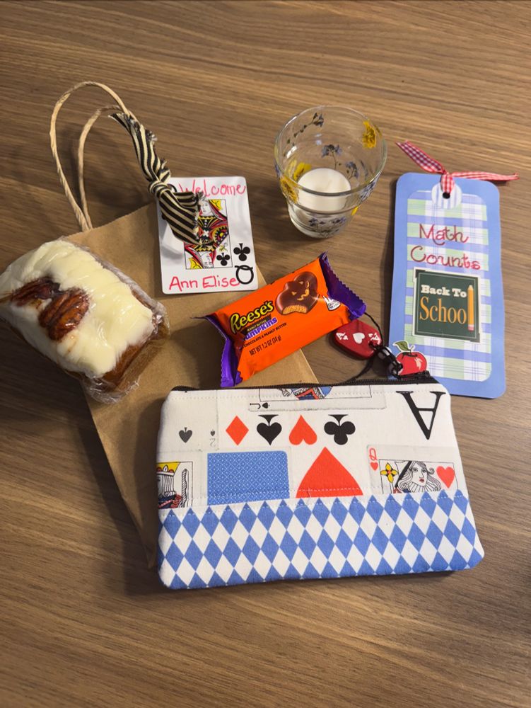 Pumpkin bread, votive with pressed flowers, bookmark, Reece’s, small satchel