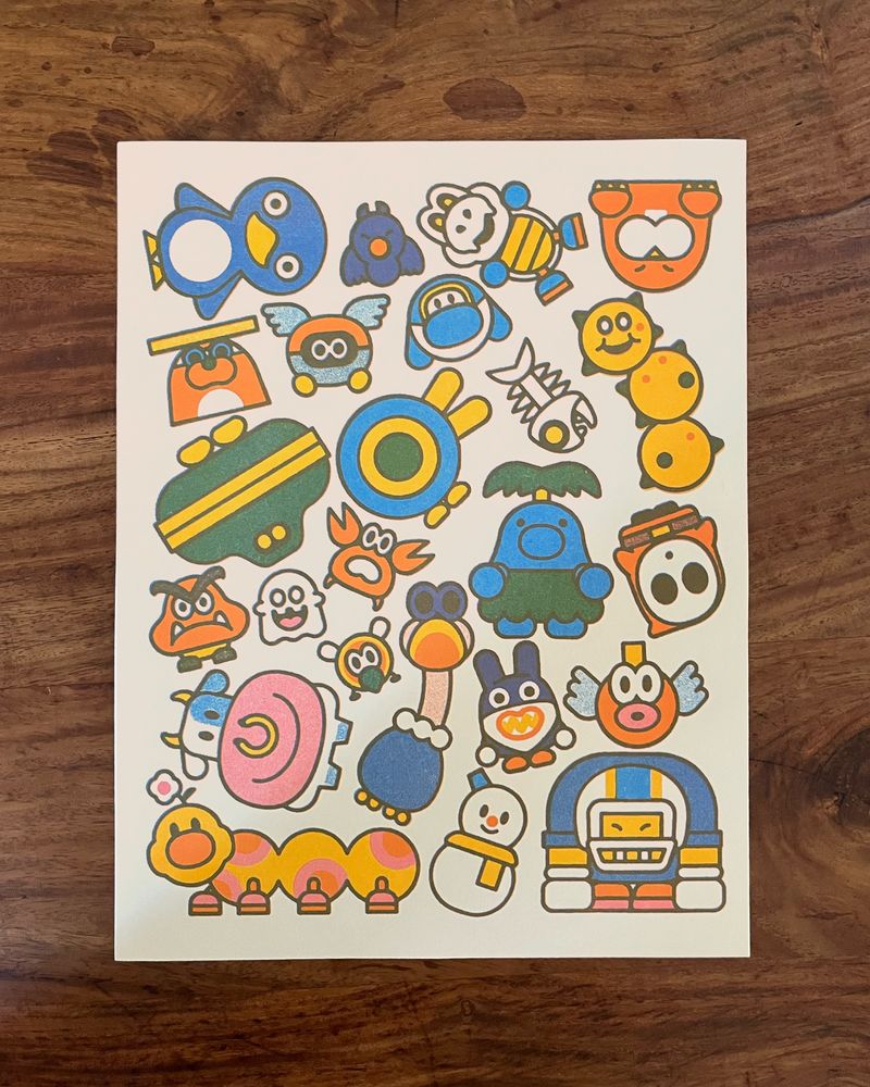 Photo of a risograph print of various characters from Mario Kart World